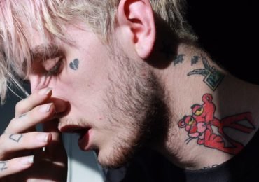 Lil peep broken heart tattoo on the face